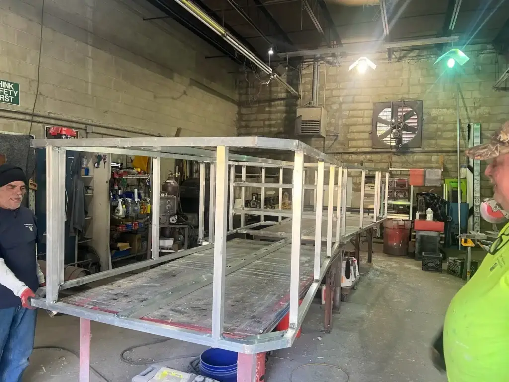 Commercial sign fabrication in shop by General Sign Service Corporation.